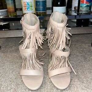 Nude anklet heels.